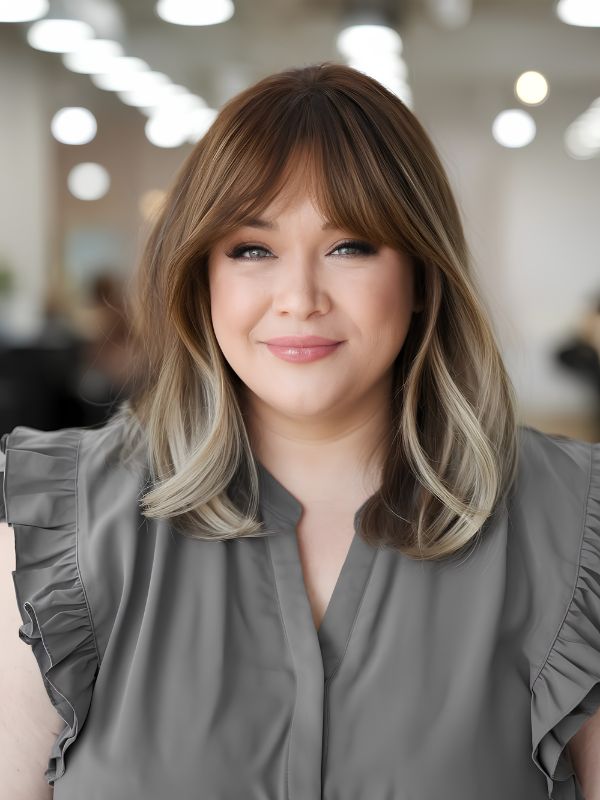 Medium-Length Cut with Curtain Bangs
