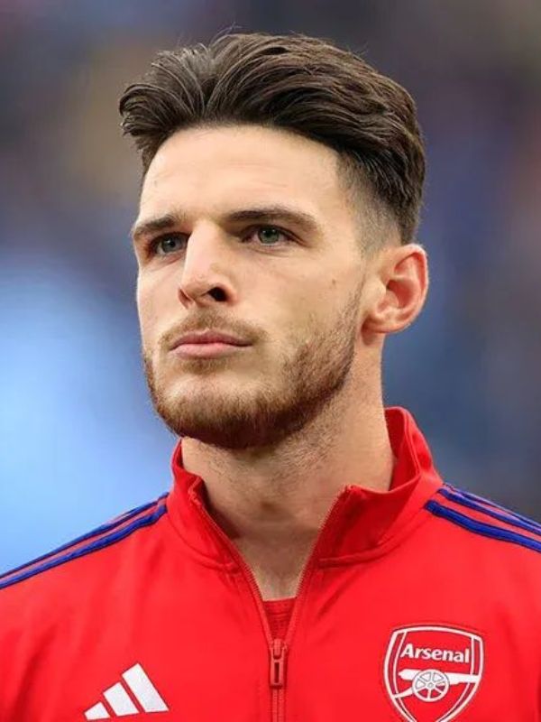 Declan Rice – Full Brush Back with Mid Taper Fade